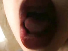 Asian girl licking window