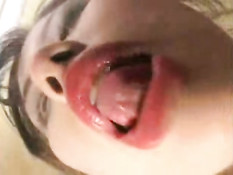 Asian girl licking window