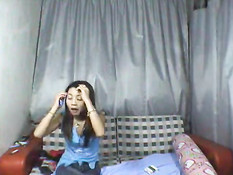 Asian teen stripping on webcam