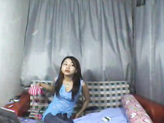 Asian teen stripping on webcam