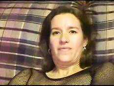 Sexy Suz doing dildo in her fishnet stocking