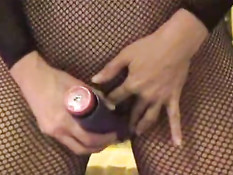 Sexy Suz doing dildo in her fishnet stocking