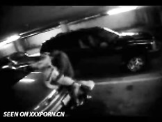 Couple caught on parkinglot cam