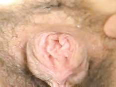 Japanese girl's hairy pussy closeup