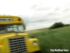 Couple in front of a bus