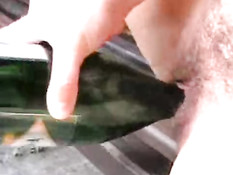 Busty chick loves to fuck a bottle