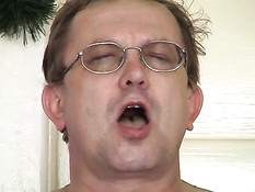 Old man fucks her with a dildo in his ass