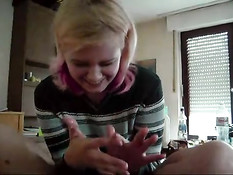 Blond german girl giving handjob