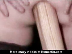 Slut puts a baseball bat up her ass
