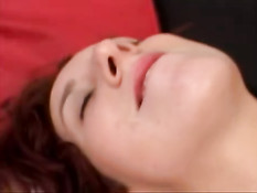 Redhead with hot tits pampering two dicks 