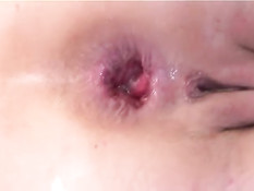 Cutie fists own ass and is pissing fan