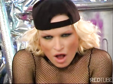 Industrial bitch works her boobs 1