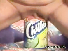 Bottle in her pierced pussy