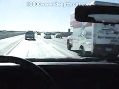 Heather serving in a car