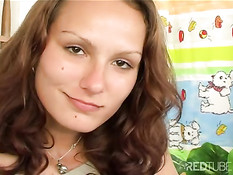 Brunette teen strokes her pussy 1