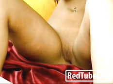 Lovely brunette stroking her pussy