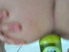 Babe playing with bottle