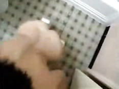 Girl gets a facial in the bathroom
