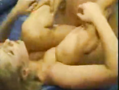 Two girls in plastic bed rubbing