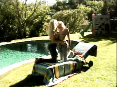 Pool, palms and sweet blond lesbians