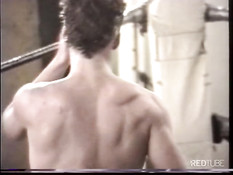 Two dudes wrestle and enable their bodys