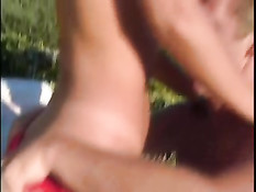 Lifeguard Couple Having Fun In The Garden