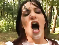 В лесу девушке вставили в анус лейку и залили туда молоко