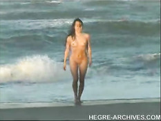 Nude beach yoga by Anahi Flores