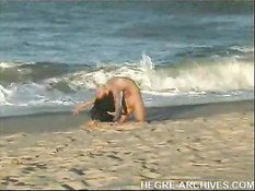 Nude beach yoga by Anahi Flores