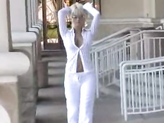 Blond high class chick teasing