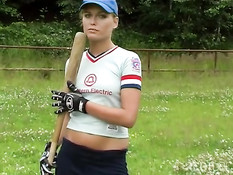 Baseball girl masturbates outdoor