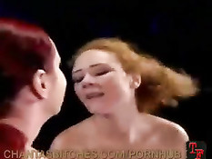 Рыжая дама отшлёпала шлюху по заднице и вставила страпон в очко