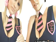 Две молодые грудастые девки ласкают друг дружку перед камерой