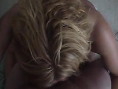 Нежная блондиночка стоя на коленях делает парню глубокий минет