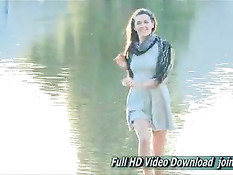 Молодая проказница гуляет без трусиков и теребит бритую письку