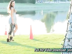 Молодая проказница гуляет без трусиков и теребит бритую письку