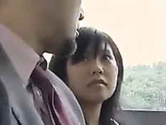Японская девка дрочит своему мужчине член в городском автобусе