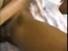 Негр с большим членом оттрахал на кровати двух молодых мулаток