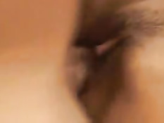 Кудрявая мулатка мастурбирует вибратором и ебётся с белым парнем