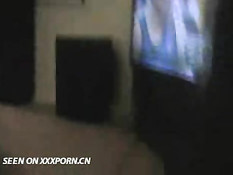 Girl giving a blowjob with the TV on
