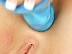 Nice blonde playing with dildo in her ass