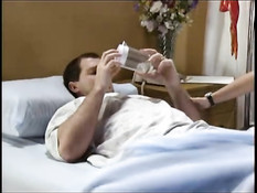 Hot nurse looking after her patient