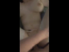 Подружка в белых чулках дрочит член рукой и большими сиськами