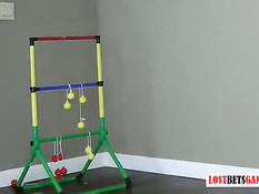 Две молоденькие лесбиянки играют с мячами и раздеваются догола