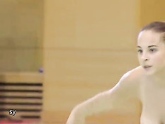 Corina doing topless gymnastics