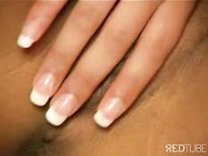 Ebony babe rubs her pussy