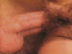 Бородатый мужчина ебёт грудастую девку на кровати в волосатую пизду