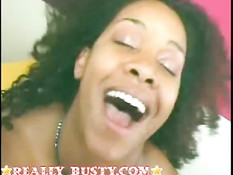 Busty black babe banging big boobs